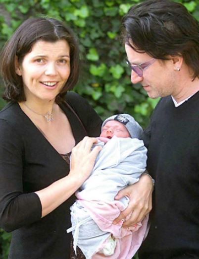 John Abraham Hewson with his parents Bono and Ali Hewson when he was born